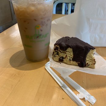 Sunflour Baking Company - Chai Latte over ice and chocolate GF scone - Bakeries Near Me - Charlotte, North Carolina Sunflour Baking Company - Chai Latte over ice and chocolate GF scone - Bakeries Near Me - Charlotte, North Carolina