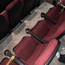 Scappoose Cinema 7 - 2 vacant seats on the left, 1 yellow taped seat on the right that was accidentally sat on. Do any of you see tape on at least 2 seats?