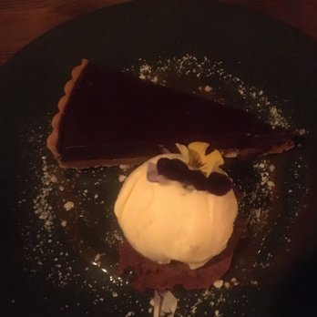 The Devil's Advocate - The chocolate torte has CARAMEL on the bottom. Served with ice cream. - Wine Bars Near Me - Edinburgh, EDH The Devil's Advocate - The chocolate torte has CARAMEL on the bottom. Served with ice cream. - Wine Bars Near Me - Edinburgh, EDH