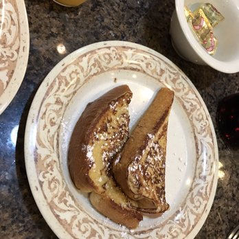 Another Broken Egg Cafe - Regular side of French toast when asked for bananas foster - Breakfast & Brunch Near Me - Pensacola, Florida Another Broken Egg Cafe - Regular side of French toast when asked for bananas foster - Breakfast & Brunch Near Me - Pensacola, Florida