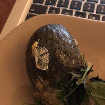McCoys Rum Room - Sticker on the avocado - Lounges Near Me - Daytona Beach, Florida