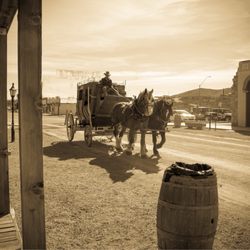 O.K. Corral - Stage coaches roam the street in front of it