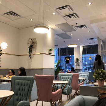 Mango Mango - people sitting at tables in a restaurant - Desserts Near Me - Montreal, Quebec