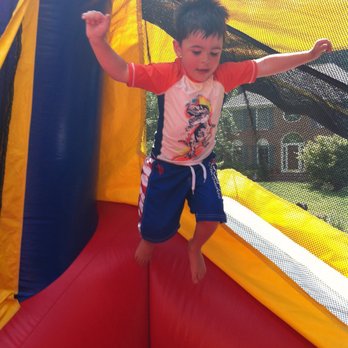 The Moonbounce Man - Has a kid ever looked more thrilled?! - Party & Event Planning Near Me - Fairfax, Virginia