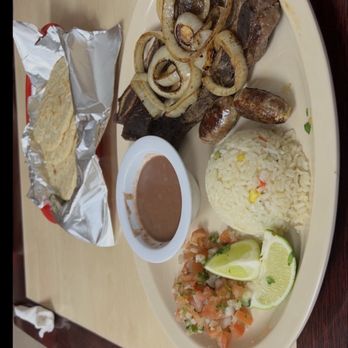 Pupusas Los Primos - Costillas de res, chorizo,rice,beans and pico de gallo - Salvadoran Near Me - Las Vegas, Nevada Pupusas Los Primos - Costillas de res, chorizo,rice,beans and pico de gallo - Salvadoran Near Me - Las Vegas, Nevada