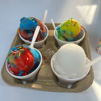 Sandra's Italian Ice - Italian ice Rainbow flavor and Coconut. Delicious and free sprinkles for the kids - Shaved Ice Near Me - Dallas, Texas Sandra's Italian Ice - Italian ice Rainbow flavor and Coconut. Delicious and free sprinkles for the kids - Shaved Ice Near Me - Dallas, Texas