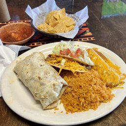 #40 on the menu. pork Burrito, beef taco, cheese enchilada with rice and beans. #40 on the menu. pork Burrito, beef taco, cheese enchilada with rice and beans.