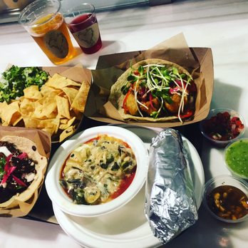 Corazon Cocina - Guacamole, queso fundido, chicken mole taco, and tempera cauliflower and avocado taco - Mexican Near Me - Santa Barbara, California Corazon Cocina - Guacamole, queso fundido, chicken mole taco, and tempera cauliflower and avocado taco - Mexican Near Me - Santa Barbara, California