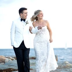C&C Design Studio - Bride and Groom walking on beach Barker Tavern wedding Scituate MA