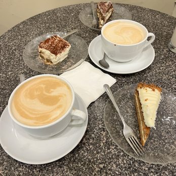 Caffe Greco - White chocolate mochas carrot cake far right Tiramisu top left Italian cake top center - Coffee & Tea Near Me - San Francisco, California Caffe Greco - White chocolate mochas carrot cake far right Tiramisu top left Italian cake top center - Coffee & Tea Near Me - San Francisco, California