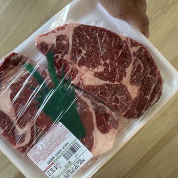 Kukje Super Market - Only one piece is ribeye and the other is New York and they always put a green thing and label to cover the lack of marbling - Grocery Near Me - Daly City, California Kukje Super Market - Only one piece is ribeye and the other is New York and they always put a green thing and label to cover the lack of marbling - Grocery Near Me - Daly City, California
