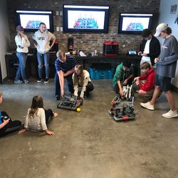 HP Robotics team showing our kids the ropes.