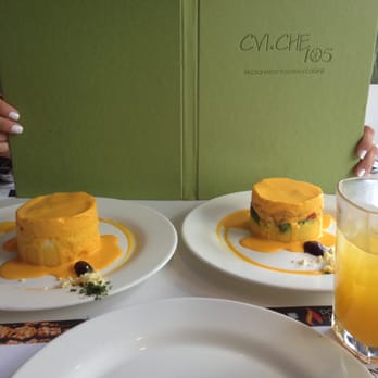 CVI.CHE 105 - Stuffed potato causa with chicken and stuffed potato causa with prawns and avocado. Also pictured, fresh passionfruit juice. - Peruvian Near Me - Miami, Florida CVI.CHE 105 - Stuffed potato causa with chicken and stuffed potato causa with prawns and avocado. Also pictured, fresh passionfruit juice. - Peruvian Near Me - Miami, Florida