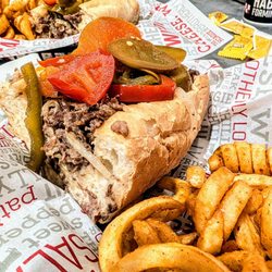 The Cheese Steak Shop - Classic cheesesteak with curly fries