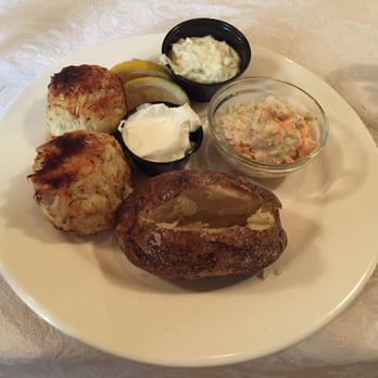 Leeds - Crab cakes with tarter sauce & a side of baked potato, sour cream and coleslaw! - American Near Me - Harrisburg, Pennsylvania Leeds - Crab cakes with tarter sauce & a side of baked potato, sour cream and coleslaw! - American Near Me - Harrisburg, Pennsylvania