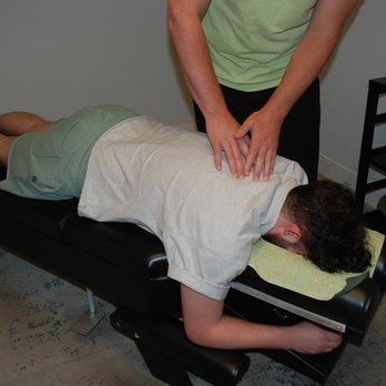 Mend - Dr. Marc just before a spinal adjustment - Chiropractors Near Me - Dallas, Texas
