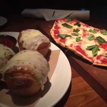 Hudson 29 Kitchen + Drink - Cheese Stuffed House Baked Butter Rolls and a Campari Tomato Flatbread - New American Near Me - Upper Arlington, Ohio Hudson 29 Kitchen + Drink - Cheese Stuffed House Baked Butter Rolls and a Campari Tomato Flatbread - New American Near Me - Upper Arlington, Ohio