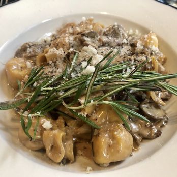 Nittis Italian Restaurant in Hell's Kitchen - Porcini pasta in cognac cream sauce with truffle oil. - Italian Near Me - New York, New York Nittis Italian Restaurant in Hell's Kitchen - Porcini pasta in cognac cream sauce with truffle oil. - Italian Near Me - New York, New York
