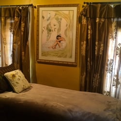 Relaxing massage room. Integrative bodywork, scrubs, and spa facials available.