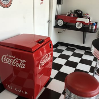 Bates Collision Centers - Channelview - Refreshment area. The cola box holds refreshments and the car on table holds hot bevs - Body Shops Near Me - Channelview, Texas