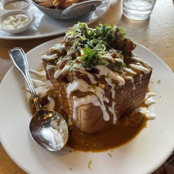 Nue - South African Bunny Chow - Tapas/Small Plates Near Me - Seattle, Washington Nue - South African Bunny Chow - Tapas/Small Plates Near Me - Seattle, Washington
