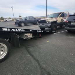 Accurate Towing assisting me to a Saturday mechanic from the parking lot of Holiday Inn.