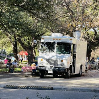 La Cantina Truck - a group of people sitting at tables in a park - Caterers Near Me La Cantina Truck - a group of people sitting at tables in a park - Caterers Near Me