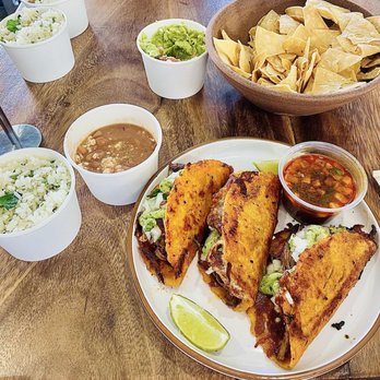 Buenos Dias - Birria tacos, beans and rice with some chips and fresh guacamole. Everything was so fresh and filling! - Mexican Near Me - Las Vegas, Nevada Buenos Dias - Birria tacos, beans and rice with some chips and fresh guacamole. Everything was so fresh and filling! - Mexican Near Me - Las Vegas, Nevada