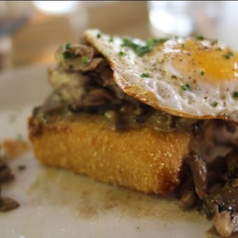 Manuela - The crispy polenta topped with maitake ragu and a fresh farm egg! - New American Near Me - Los Angeles, California