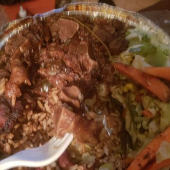 Exquisite Delight - Oxtail bones swimming in gravy and oil - Caribbean Near Me - Brooklyn, New York