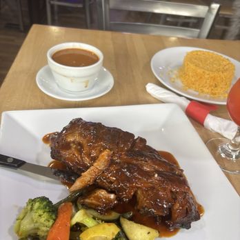 Caridad and Louie's Restaurant - Bbq ribs with beans and rice - Italian Near Me - Bronx, New York Caridad and Louie's Restaurant - Bbq ribs with beans and rice - Italian Near Me - Bronx, New York