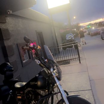 Scorez Sports Bar - a motorcycle parked on the sidewalk - Sports Bars Near Me - Lehi, Utah Scorez Sports Bar - a motorcycle parked on the sidewalk - Sports Bars Near Me - Lehi, Utah
