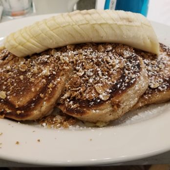 Briarpatch Restaurant - Granola wheat and fiber pancakes. Comes with the banana - American Near Me - Winter Park, Florida