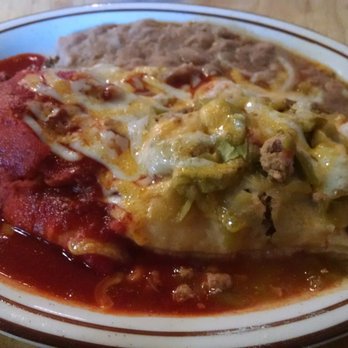 Pete's Cafe - 2 beef stuffed sopapillas Christmas style.. Green chile is weak it's like a tasteless piece of thick lettuce. Beans were good. - Mexican Near Me - Belen, New Mexico Pete's Cafe - 2 beef stuffed sopapillas Christmas style.. Green chile is weak it's like a tasteless piece of thick lettuce. Beans were good. - Mexican Near Me - Belen, New Mexico