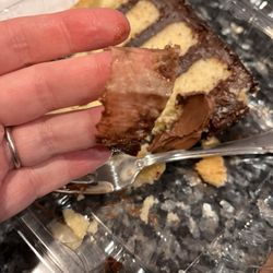 Santini's New York Style Deli - Paper inside the cake layers. Extra chewy!