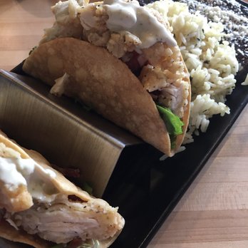 Prados Modern Mexican Cantina - Fried chicken taco combo includes two crispy or soft tacos, black beans, and cilantro rice. - Latin American Near Me - Lake St Louis, Missouri
