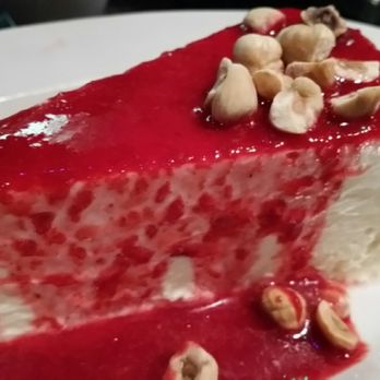 Buca di Beppo Italian Restaurant - Homemade Cheesecake with raspberry topping. - Italian Near Me - Lombard, Illinois Buca di Beppo Italian Restaurant - Homemade Cheesecake with raspberry topping. - Italian Near Me - Lombard, Illinois