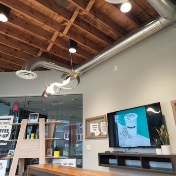 Coroco Coffee Roaster Collective - This light fixture over the table is so cool. - Coffee & Tea Near Me - Sycamore, Illinois