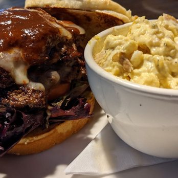 The Dam Pub - Steakhouse burger and a side of potato salad. - Pubs Near Me - Des Moines, Iowa The Dam Pub - Steakhouse burger and a side of potato salad. - Pubs Near Me - Des Moines, Iowa