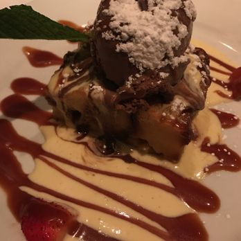 Valenza - Bread pudding with the silkiest dark chocolate ice cream on top - Italian Near Me - Atlanta, Georgia Valenza - Bread pudding with the silkiest dark chocolate ice cream on top - Italian Near Me - Atlanta, Georgia