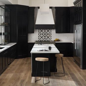 New Age Cabinet Coatings - a kitchen with black cabinets and white countertops - General Contractors Near Me - Phoenix, Arizona New Age Cabinet Coatings - a kitchen with black cabinets and white countertops - General Contractors Near Me - Phoenix, Arizona