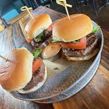 Sid's Garage - BIT SLIDER TRIO-100% wagyu, jalapeno candied bacon tomato, sriracha-bourbon sauce lettuce - Beer Bar Near Me - Boise, Idaho