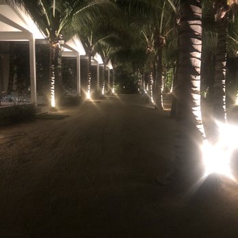 Bungalows Key Largo - Lit path way to bungalow rooms - Resorts Near Me - Key Largo, Florida