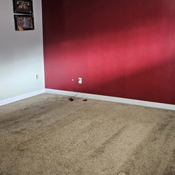 Elite Carpet & Tile - Before pic of the bedroom