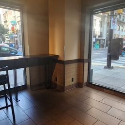 "Hightop" bar seating, no tables "Hightop" bar seating, no tables
