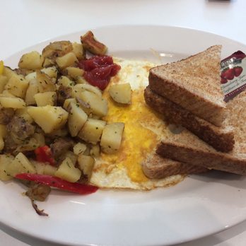 Breakfast Room - a plate of food with toast and potatoes - Breakfast & Brunch Near Me - Toronto, Ontario
