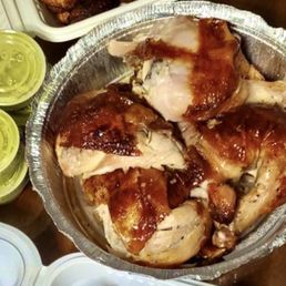 Peruvian rotisserie chicken with their amazing spicy green sauce Peruvian rotisserie chicken with their amazing spicy green sauce
