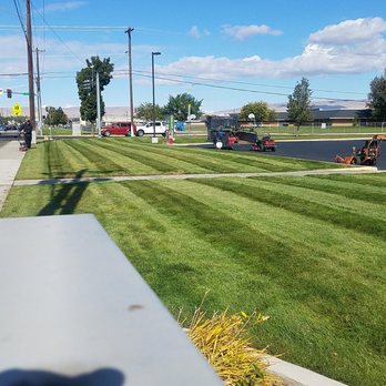IVE Landscaping - a view of a gas station - Landscaping Near Me