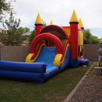 Bouncy Bouncy Inflatables - It seemed huge but fit in my backyard. You can see where the water hose at the top of the netting/slide is hanging out of a tie-down. - Party Equipment Rentals Near Me - Gilbert, Arizona Bouncy Bouncy Inflatables - It seemed huge but fit in my backyard. You can see where the water hose at the top of the netting/slide is hanging out of a tie-down. - Party Equipment Rentals Near Me - Gilbert, Arizona