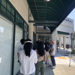 Exterior outside entrance of Orange Square - Cupertino - Long line - Cupertino, California Exterior outside entrance of Orange Square - Cupertino - Long line - Cupertino, California
